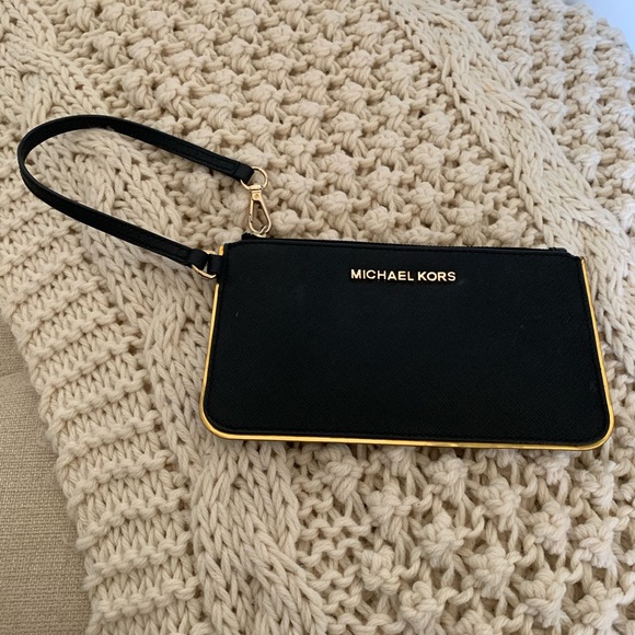 Michael Kors Handbags - Michael Kors Coated Wallet Clutch